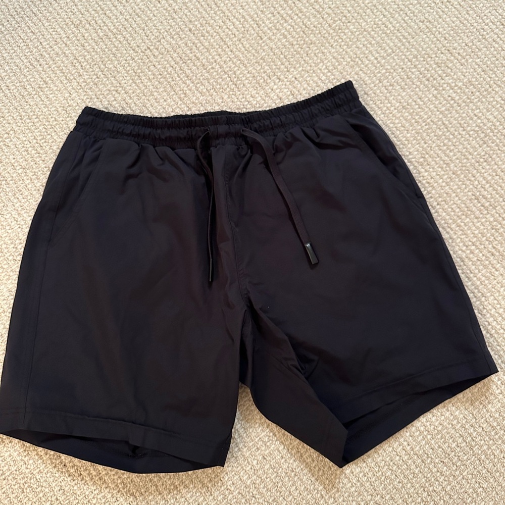 Bearbottom Base Shorts in Black 7 Inches